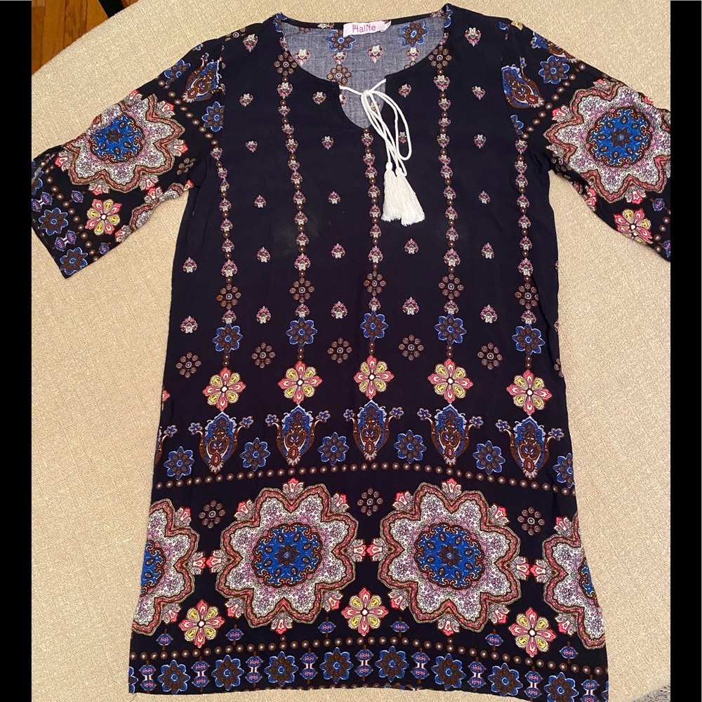 Casual medium sized dress.						95% polyester 5% spandex